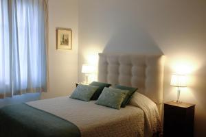 Łóżko lub łóżka w pokoju w obiekcie Maison Marais