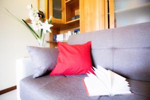 A seating area at InnPisaRentals 2- Pisa Books & Tower Apartment