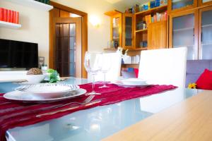 A seating area at InnPisaRentals 2- Pisa Books & Tower Apartment