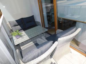 Posedenie v ubytovaní Apartamenty Via Marina