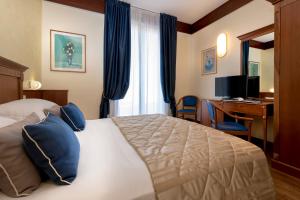 Postel nebo postele na pokoji v ubytování Hotel Bellevue + 31 fotografií
