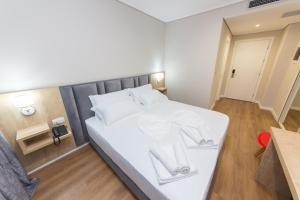 CLASS Hotel 객실 침대