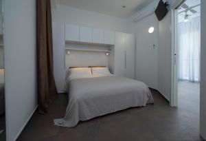 Postel nebo postele na pokoji v ubytování Hotel Niagara