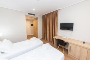 CLASS Hotel 객실 침대
