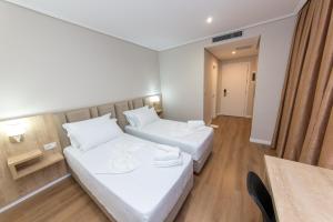 CLASS Hotel 객실 침대
