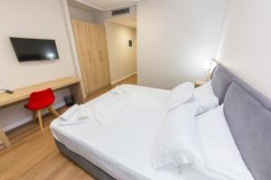 CLASS Hotel 객실 침대