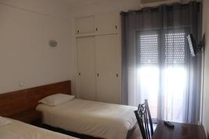 Voodi või voodid majutusasutuse Eurosun Hotels Loulé toas
