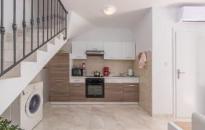 Kuchyň nebo kuchyňský kout v ubytování Apartment Rosetta