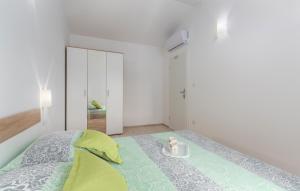 Postel nebo postele na pokoji v ubytování Apartment Rosetta