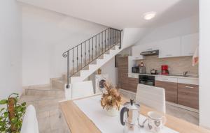 Kuchyň nebo kuchyňský kout v ubytování Apartment Rosetta