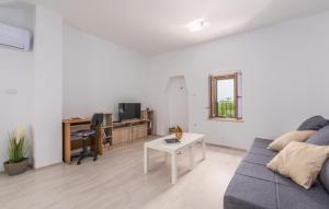 TV a/nebo společenská místnost v ubytování Apartment Rosetta