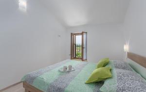 Postel nebo postele na pokoji v ubytování Apartment Rosetta