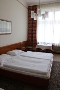 Postel nebo postele na pokoji v ubytování Pension Reimer