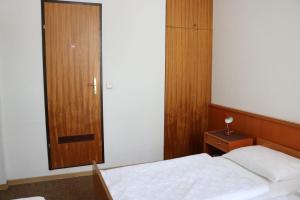 Postel nebo postele na pokoji v ubytování Pension Reimer