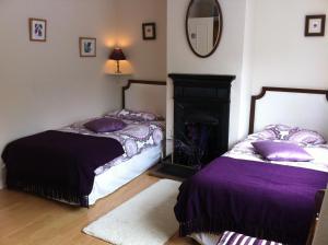 Cama ou camas em um quarto em Sea Breeze Bed and Breakfast