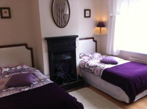 Cama ou camas em um quarto em Sea Breeze Bed and Breakfast
