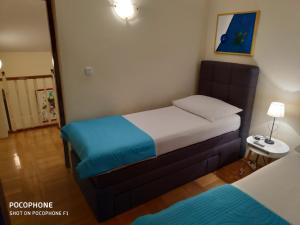 เตียงในห้องที่ Villa Lisinski