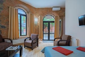 Posezení v ubytování Wine Inn Borjomi Aparthotel