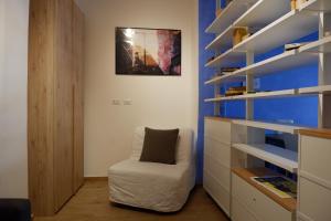A seating area at The Blue Strawberry House in San Giovanni Roma