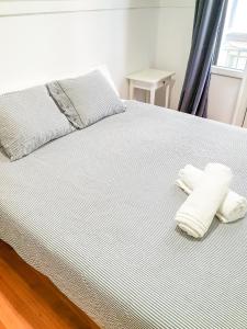 Posteľ alebo postele v izbe v ubytovaní Pension Aussie Guesthouse