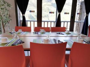 En restaurant eller et andet spisested på Résidence Mer & Golf Tourmalet