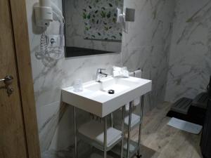 Koupelna v ubytování Hotel Primavera