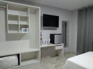 TV a/nebo společenská místnost v ubytování Hotel Primavera