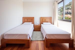 Postel nebo postele na pokoji v ubytování Elegant Apartment with Sea Views by Trip2Portugal