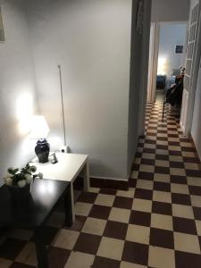 Postel nebo postele na pokoji v ubytování Apartamento Plaza de Doña Elvira 8