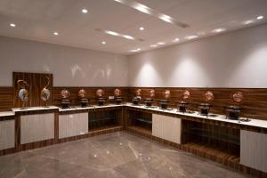 El área de trabajo o centro de convenciones de Hotel Gems Inn