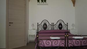 Postel nebo postele na pokoji v ubytování Borgo Sofia Bed and Breakfast