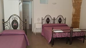 Postel nebo postele na pokoji v ubytování Borgo Sofia Bed and Breakfast