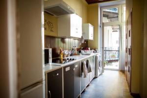Kuchyňa alebo kuchynka v ubytovaní Hostel Centrum Sabot