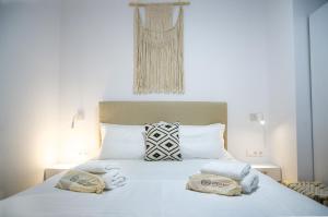 Katil atau katil-katil dalam bilik di Thea Suites Potidea