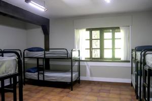Postel nebo postele na pokoji v ubytování Albergue de Peregrinos Gerekiz