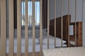 Łóżko lub łóżka w pokoju w obiekcie Hotel Almtalerhof