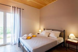 Posteľ alebo postele v izbe v ubytovaní Villa Vendema