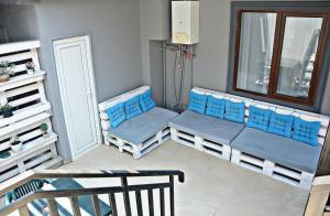 Postel nebo postele na pokoji v ubytování Apartments On Vaja Pshavela