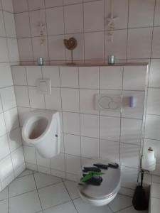 Koupelna v ubytování Ferienwohnung Heck + 13 fotografií