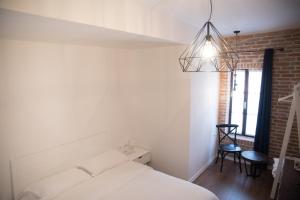 Letto o letti in una camera di Old Bazaar Rooms