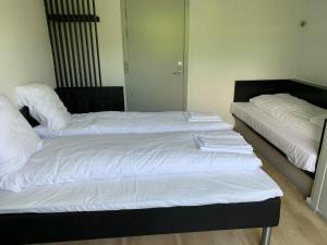 Postel nebo postele na pokoji v ubytování Motel oasen