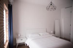 Letto o letti in una camera di Old Bazaar Rooms