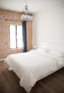 Letto o letti in una camera di Old Bazaar Rooms