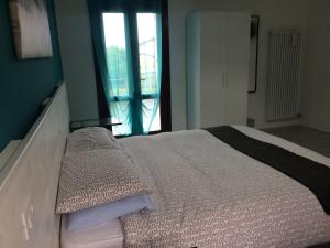 Posteľ alebo postele v izbe v ubytovaní Al 97 Locazione turistica