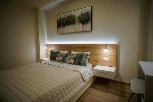 Voodi või voodid majutusasutuse Sandika apartments toas