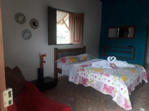 Postel nebo postele na pokoji v ubytování Hotel Dulce Campestre