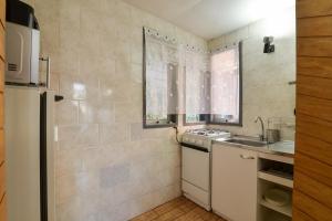 Köök või kööginurk majutusasutuses Cabañas Neuquen +37 fotot