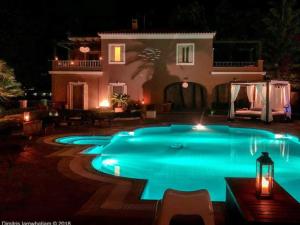 The swimming pool at or close to Villa Dolphin Akrata