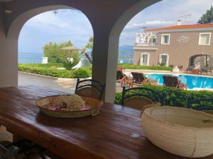 The swimming pool at or close to Villa Dolphin Akrata