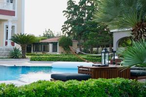 The swimming pool at or close to Villa Dolphin Akrata